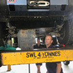 Mechanic Working Under the Truck — Mechanic in Mackay, QLD
